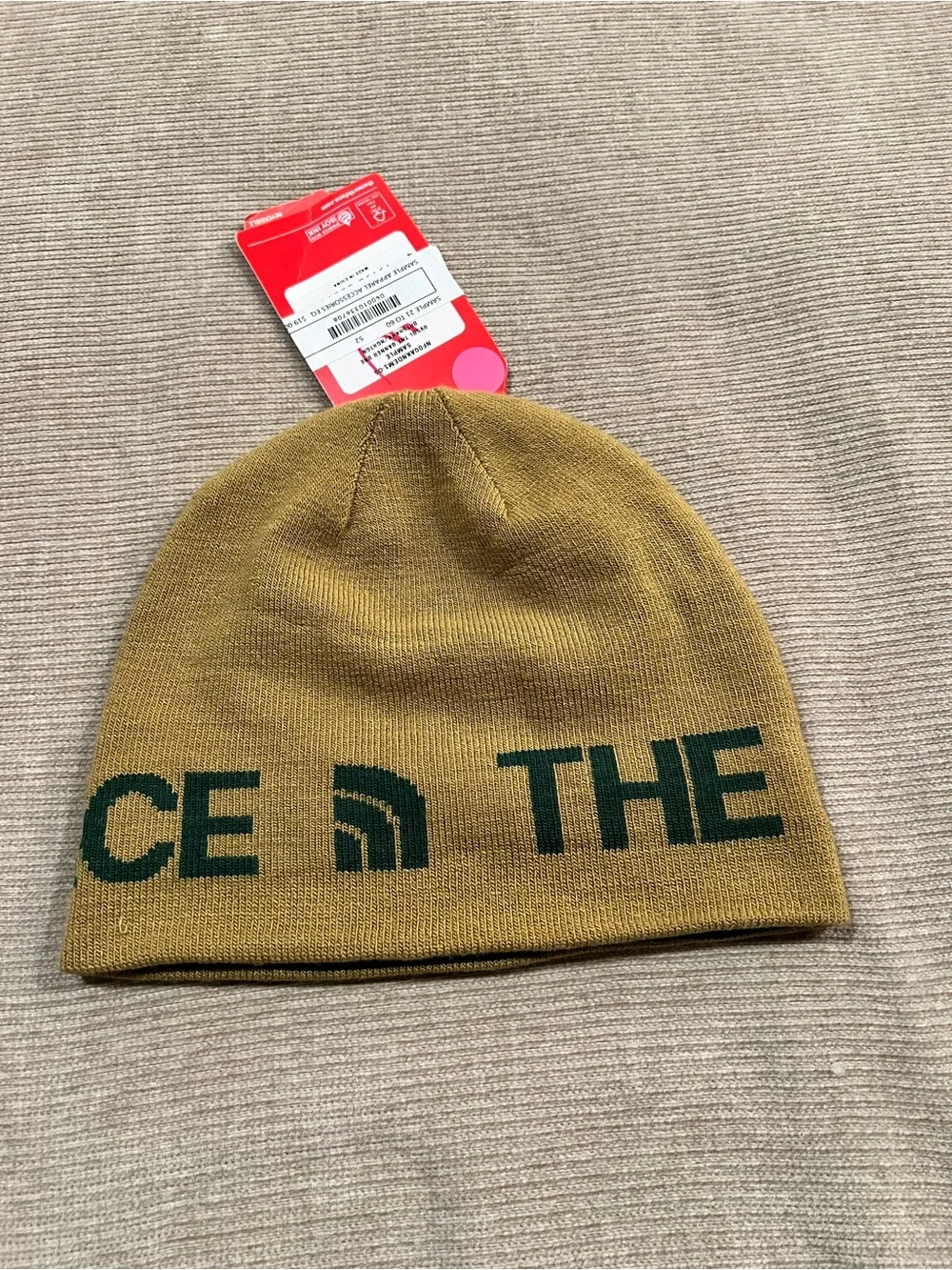 The North Face Mustard Yellow Beanie with Dark Green Lettering